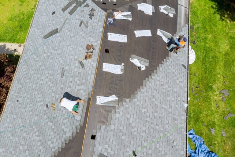roof replacement repair roofer working on replacement asphalt shingle roof 1920
